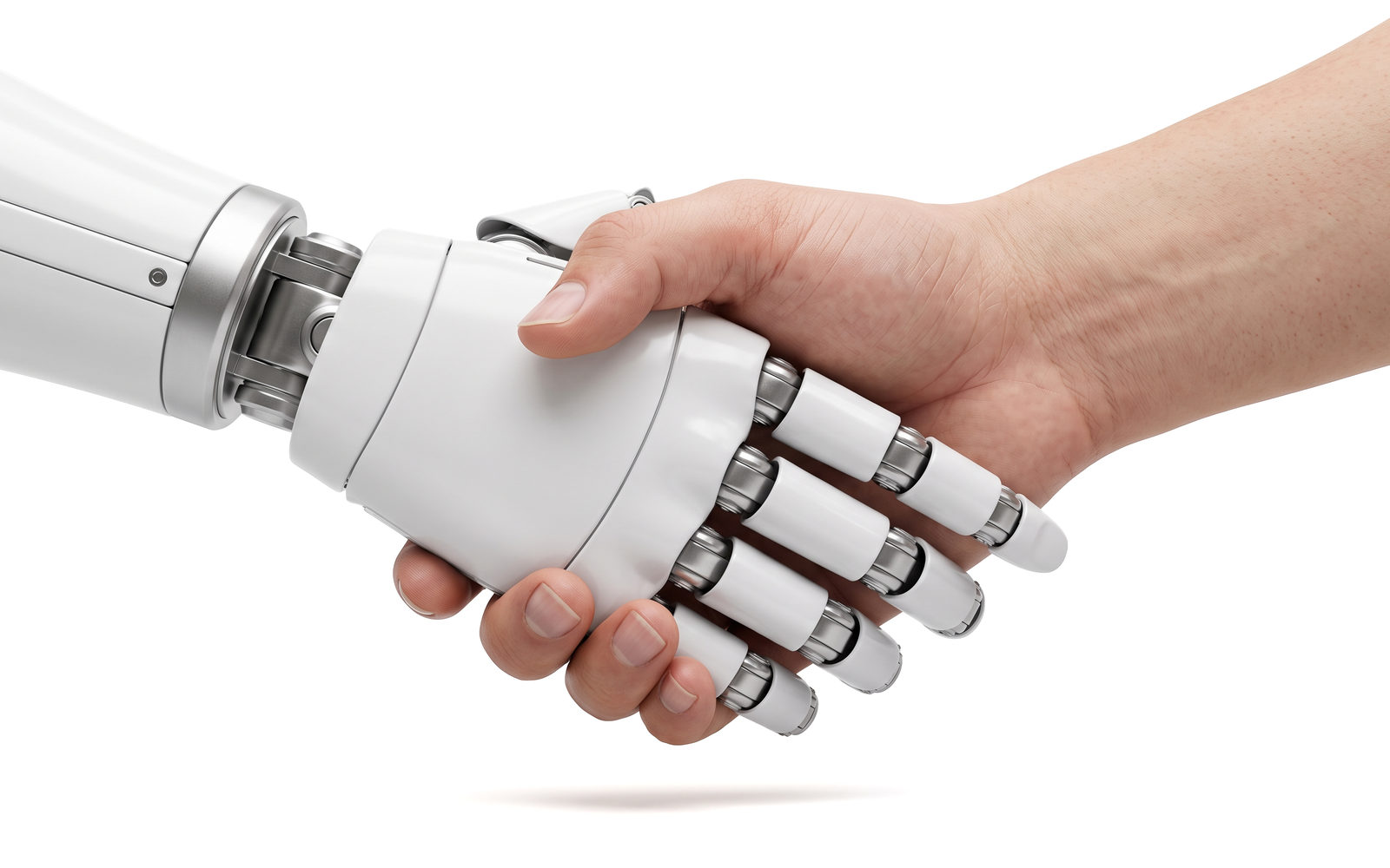 Human hand shaking a white robotic hand on a clean white background